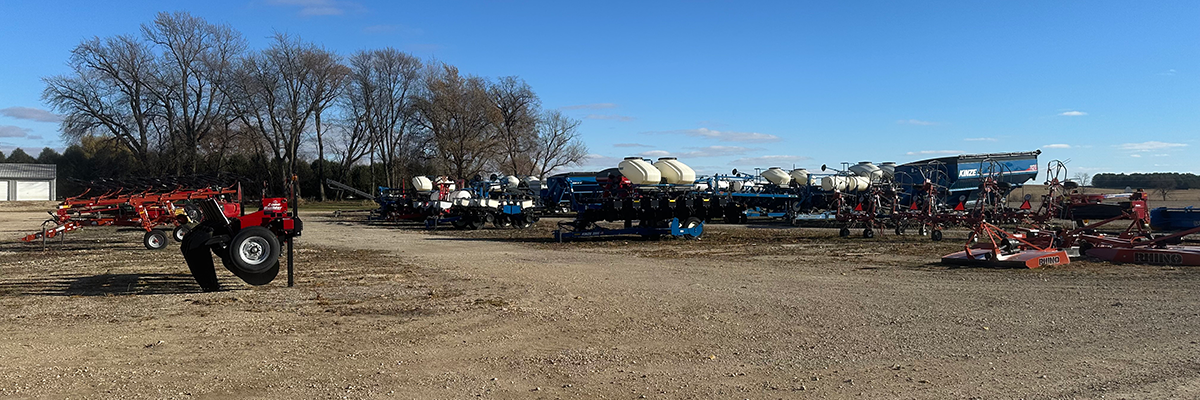 Farm Equipment parked on a gravel road